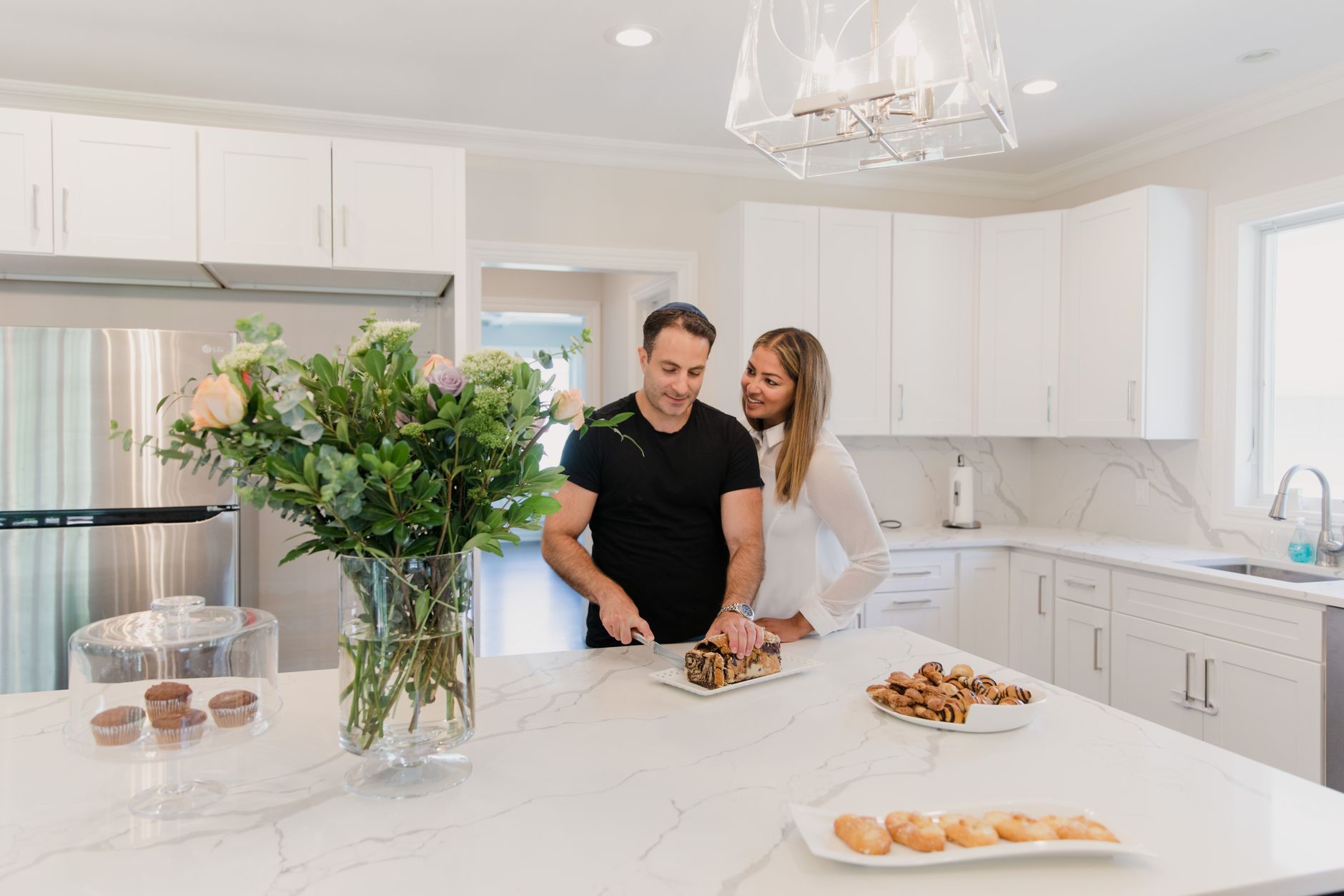 A kitchen with a white countertop